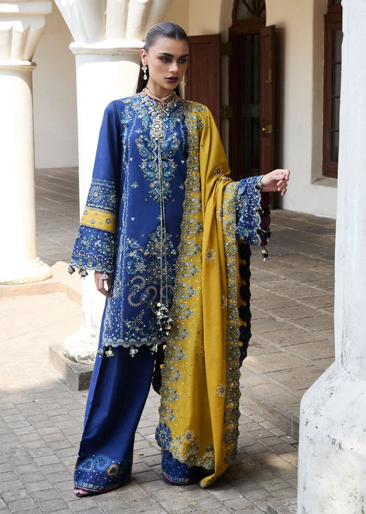 Royal blue embroidered Dhanak shirt and trouser with a contrasting mustard yellow digital printed wool shawl.