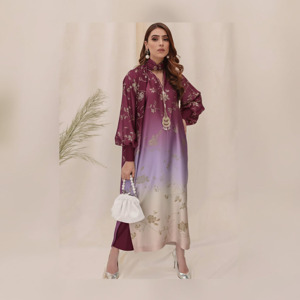 Woman wearing a gradient dress with floral patterns against a neutral background