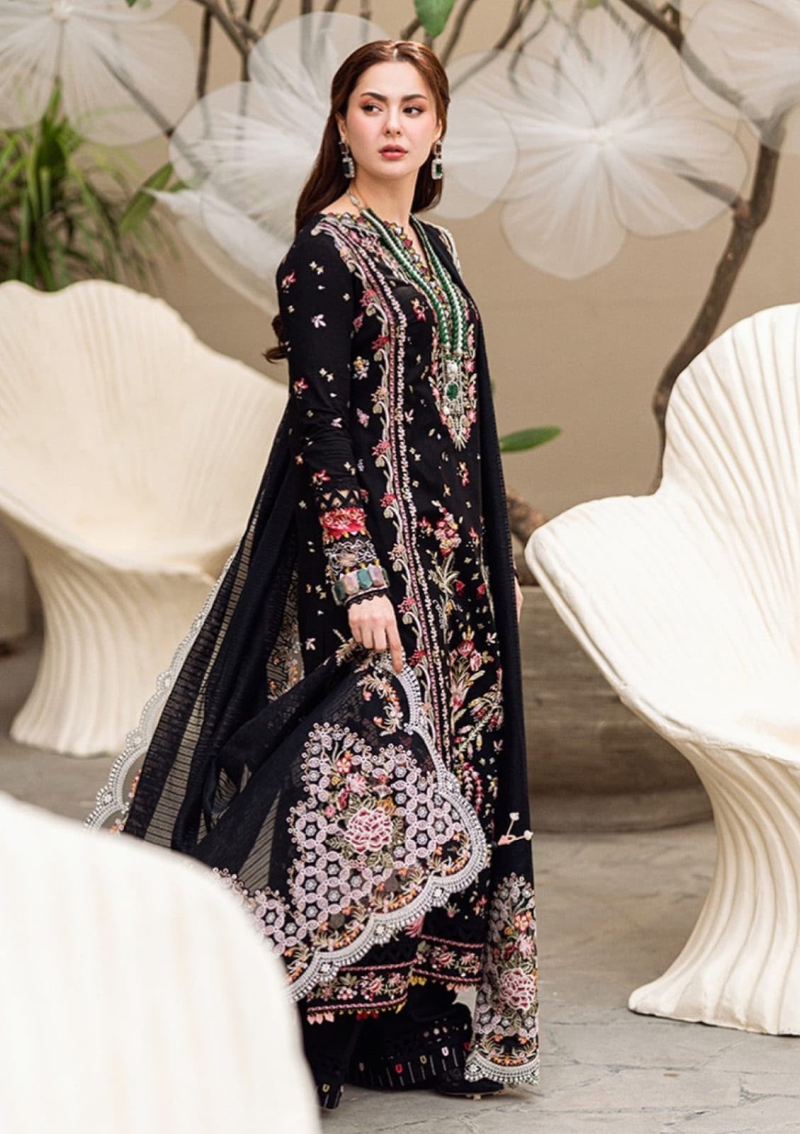 Qalamkar black Dhanak 3 piece suit featuring colorful embroidery and an embroidered Dhanak shawl.   