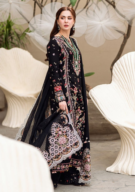Qalamkar black Dhanak 3 piece suit featuring colorful embroidery and an embroidered Dhanak shawl.   