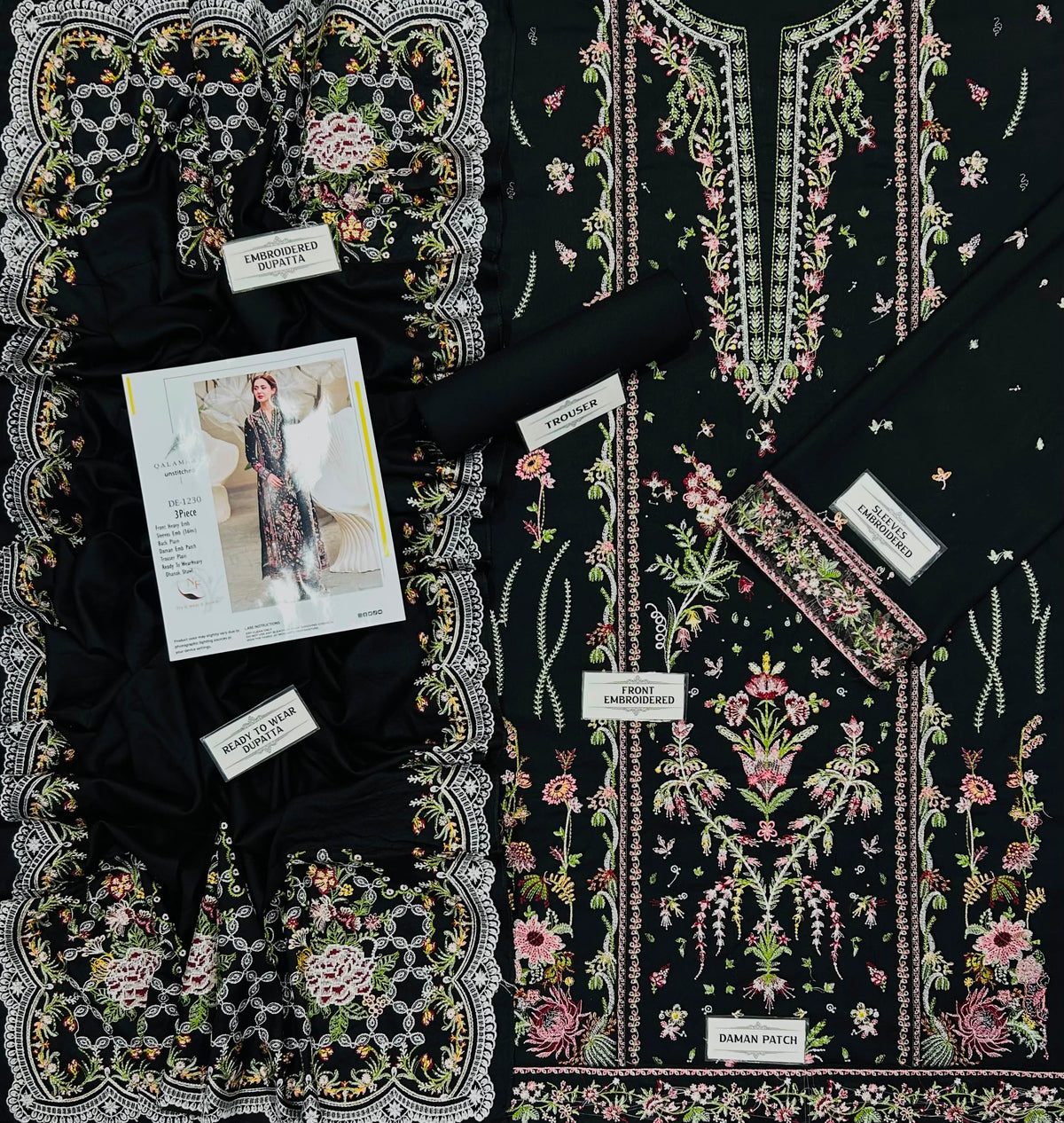 Qalamkar black Dhanak 3 piece suit featuring colorful embroidery and an embroidered Dhanak shawl.   