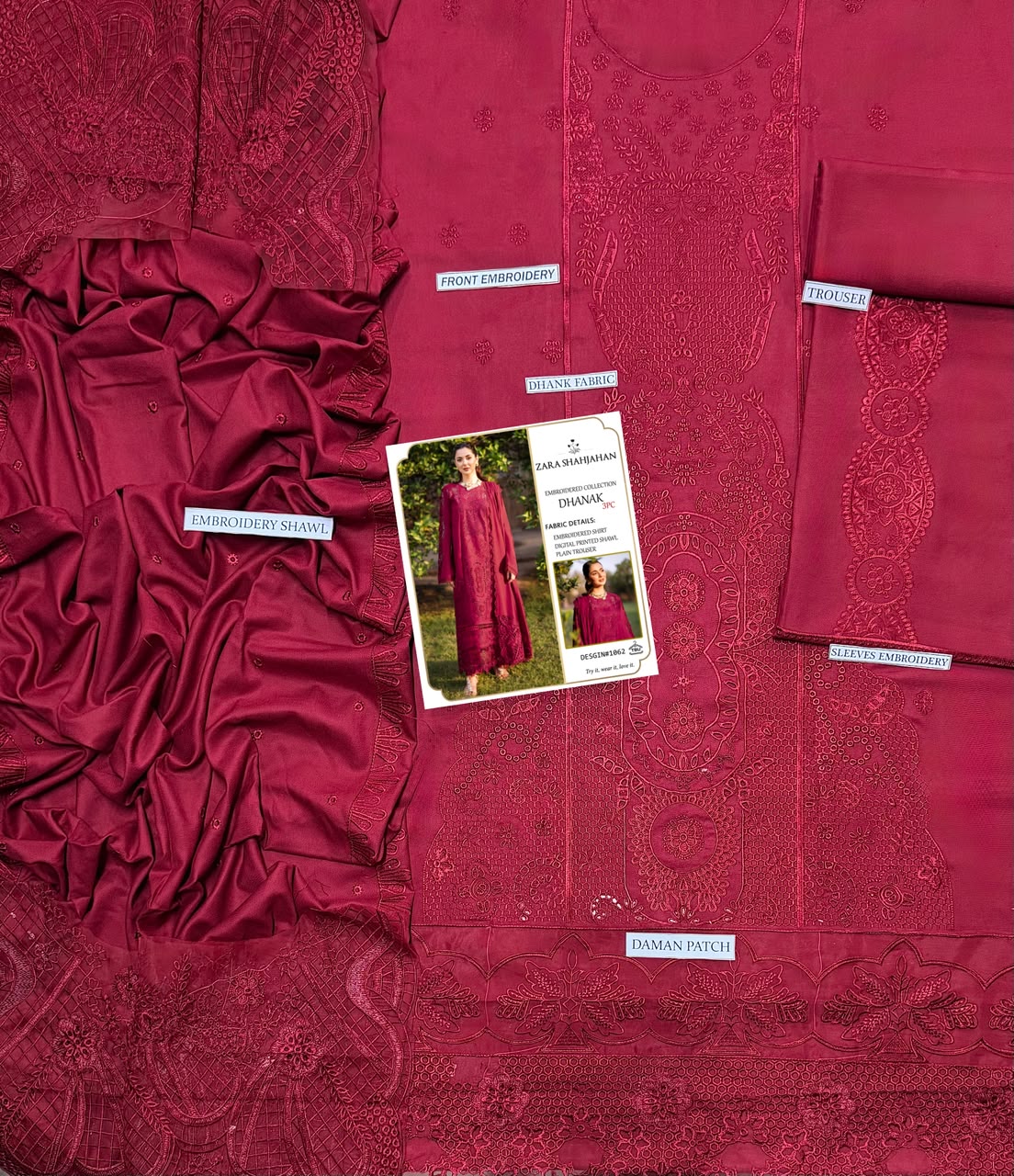 A flat-lay presentation of a deep magenta pink ethnic fabric set, featuring embroidered cotton fabric, sheer lace, draped satin fabric, and a folded dupatta. A small product card for 'Sara Asad Khan' is placed in the center.