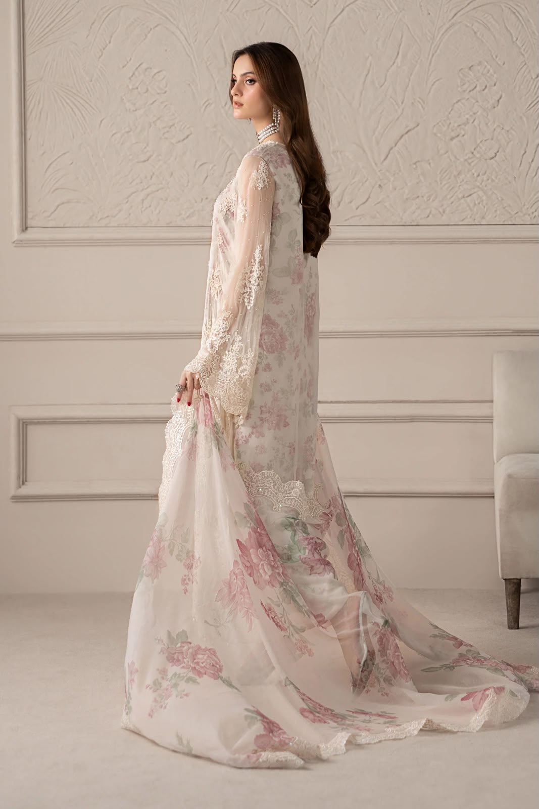 Maria B off-white floral embroidered chiffon shirt with Adda handwork and digital printed silk trouser.   