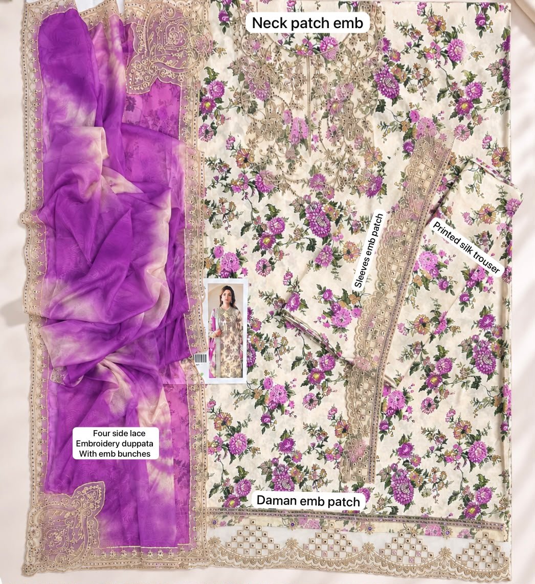 A flat-lay view of a traditional embroidered fabric set, likely for a salwar kameez or suit. The main fabric is cream-colored with a dense floral print in pink, purple, and green, featuring gold zari embroidery.
